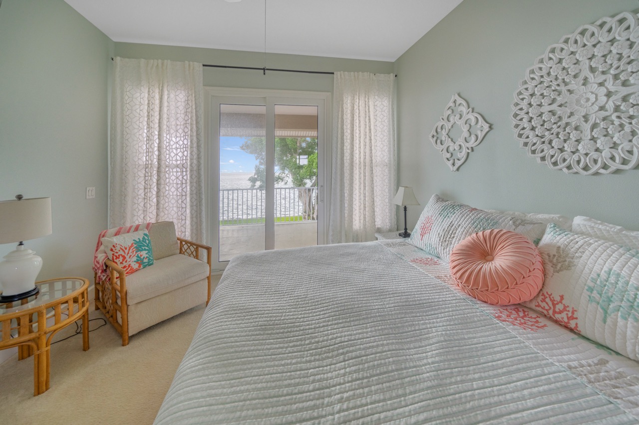 Waterfront guest suite with balcony access